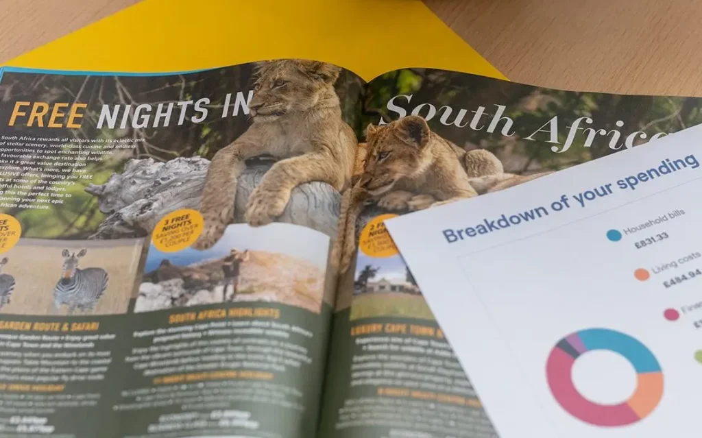 Breakdown of spending with holiday brochure